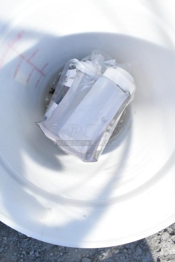 4-tier chrome wire shelving unit with contents including a sink. Buyer must dismantle. Consider freight charges.