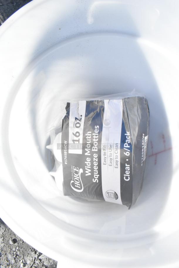 Pack of Choice 16 oz wide mouth squeeze bottles in a plastic container. Easy to fill, use, and clean. Clear, 6 pack.