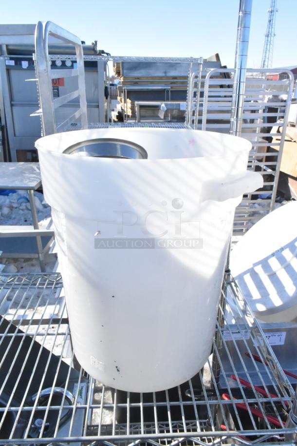 Chrome finish 4-tier wire shelving unit with contents, including a sink. Buyer must dismantle for pickup.