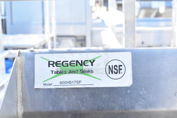 Chrome finish 4-tier wire shelving unit with contents including sink. Regency label, model 600HS17SP, NSF certified. Buyer must dismantle.