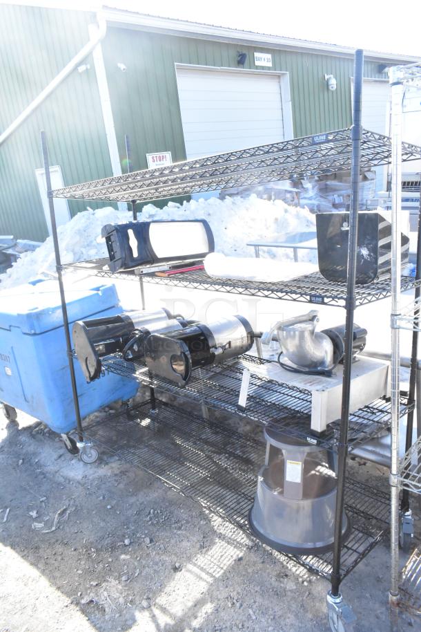 Black finish 4-tier wire shelving unit with napkin dispensers, Uline brand. Requires self-dismantling. Consider freight charges.