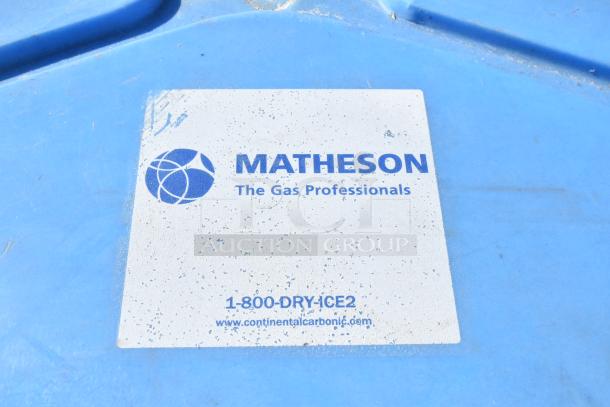 Thermosafe HRMP3-LC blue poly cart with commercial casters. Label reads "Matheson - The Gas Professionals," with contact info.