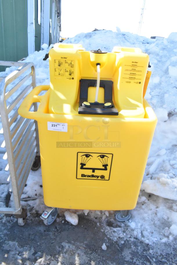 Bradley S19-921 Gravity Feed Eye Wash, yellow, mobile with wheels, clear instructions on unit, good condition.
