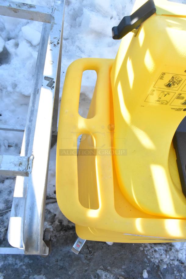 Bradley S19-921 Gravity Feed Eye Wash, yellow, durable plastic, control handle visible, good condition.