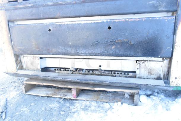 Montague 24P-2 commercial pizza oven, natural gas powered, single deck, showcases wear, ideal for high-volume usage.