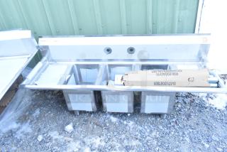 BRAND NEW Regency 600S31014212 stainless steel three-compartment commercial sink with galvanized steel legs, 2 drainboards.
