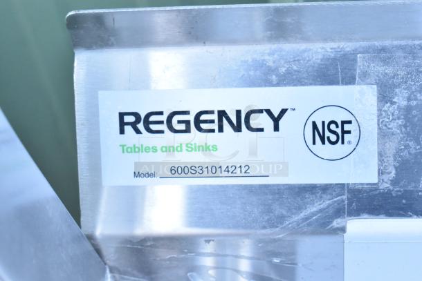 Brand new Regency 600S31014212 commercial sink, 16-gauge stainless steel, 3 compartments, galvanized legs, 2 drainboards.