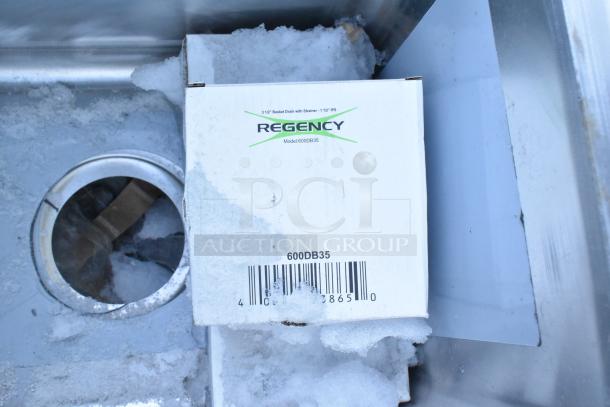 BRAND NEW Regency commercial sink, 3 compartments, 16-gauge stainless steel, galvanized legs, with scratches and dents.