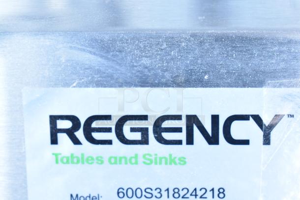 Regency 600S31824218 commercial sink with 3 compartments, 2 drainboards, 16-gauge stainless steel, brand new, no legs.