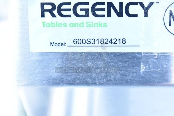 Regency 600S31824218 stainless steel commercial sink label, featuring model number and branding. New, scratch and dent, no legs.