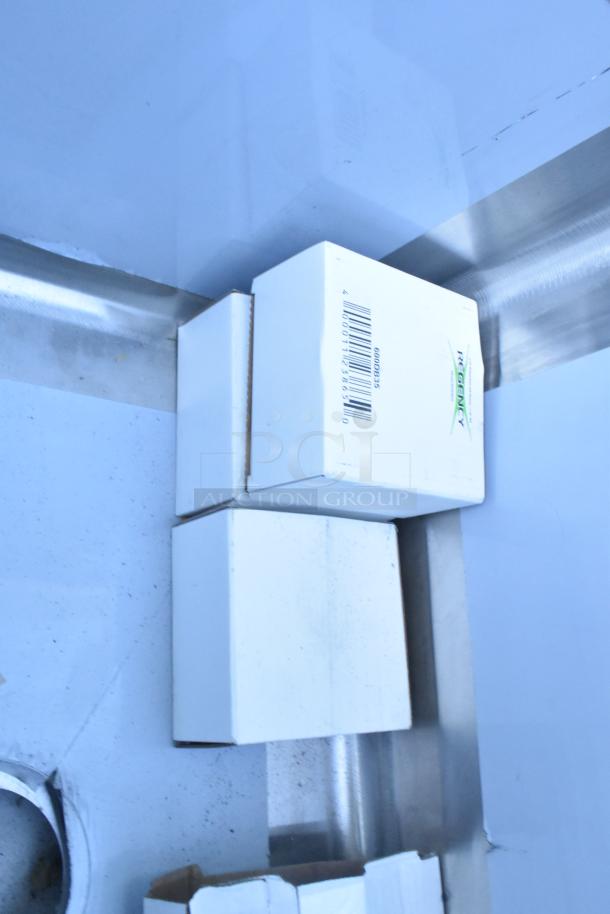 Brand new Regency 600S31824224 stainless steel commercial sink, three compartments, scratches and dents, no legs.