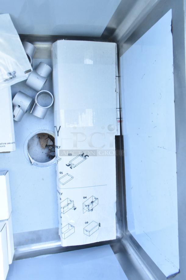 Brand new Regency 600S31824224 three-compartment stainless steel sink, 16-gauge, with 2 drainboards. No legs included.