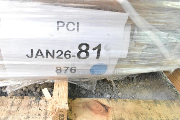 12 brand new scratch and dent items wrapped, including tabletops, shelf, folding table; tag shows "PCI JAN26-81 876".