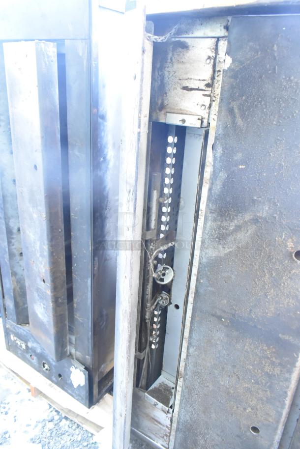 Montague 24P-2 commercial pizza oven, natural gas, single deck, visible wear, natural metal finish, needs cleaning.