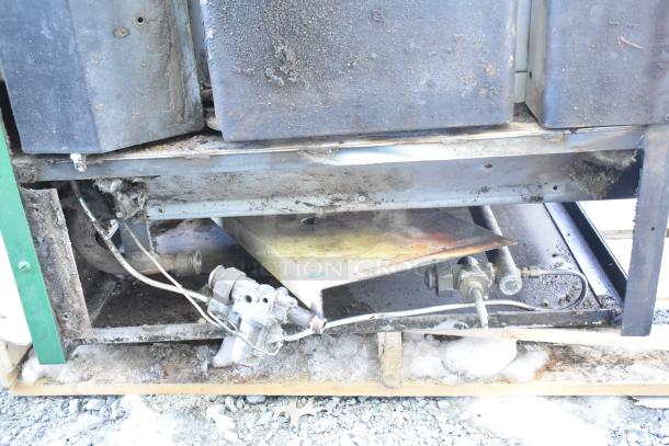 Montague 24P-2 commercial natural gas pizza oven, single deck, visible wear, needs cleaning, exterior components shown.