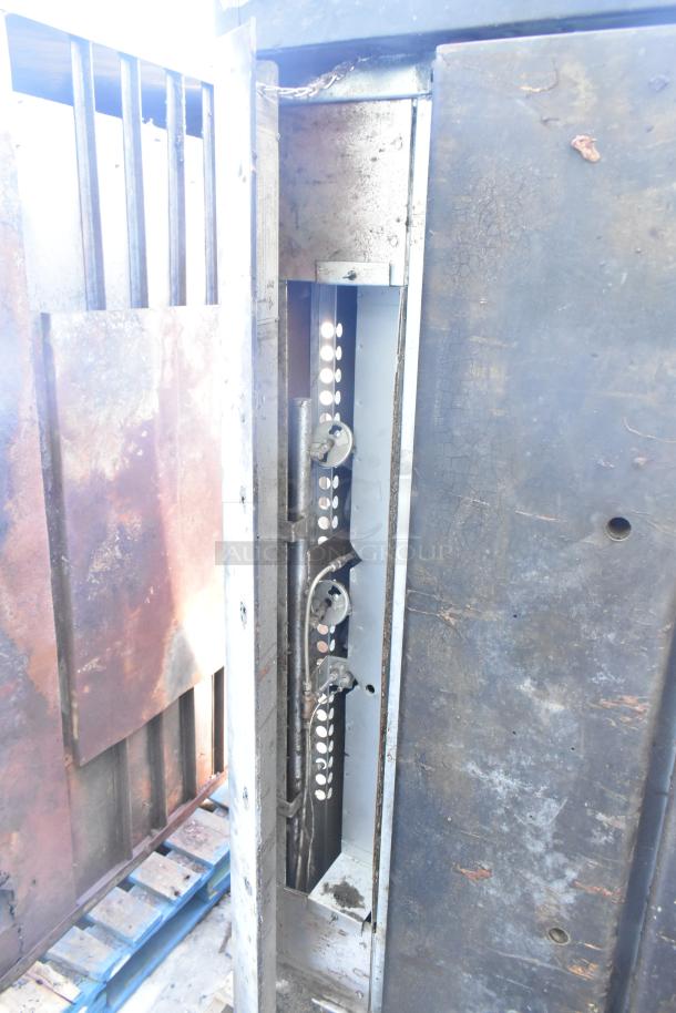 Montague 24P-2 commercial pizza oven, natural gas powered, single deck, used condition, visible interior components.