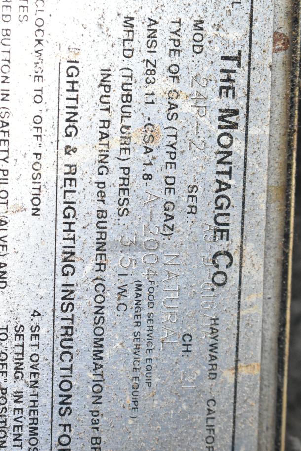 Montague 24P-2 Commercial Natural Gas Pizza Oven, single deck, model info plaque visible, weathered condition.