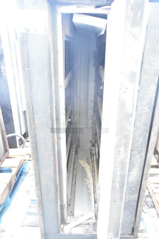 Montague commercial natural gas pizza oven, single deck. Visible wear and dust. Ideal for high-volume pizza baking.