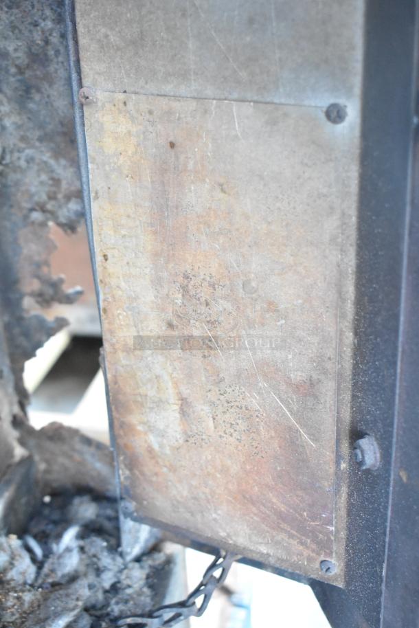 Montague Commercial Natural Gas Pizza Oven, single deck model. Visible surface wear, metal components intact.