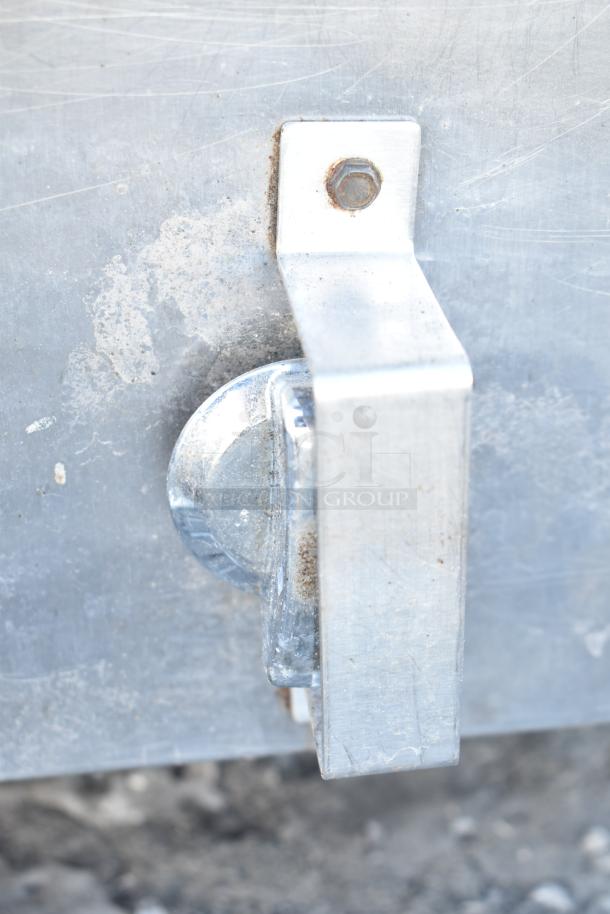 Montague Commercial Natural Gas Pizza Oven detail showing a metal bracket with bolt, indicating sturdy construction.