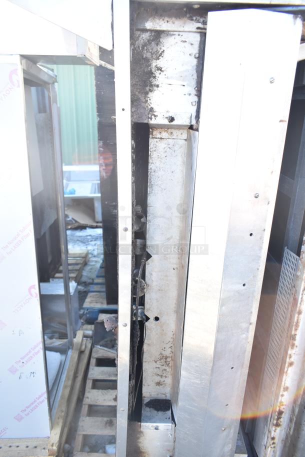 Montague commercial natural gas single deck pizza oven, visible wear, metal construction, includes legs, suitable for restaurants.