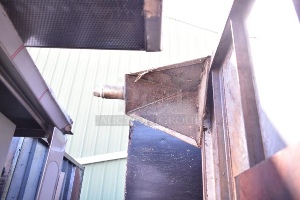 Montague commercial natural gas single deck pizza oven with legs, visible wear, metal construction, exterior view.