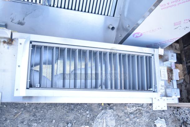 BRAND NEW SCRATCH AND DENT CaptiveAire 6024 ND-2WI commercial air grease hood with filters and lights, visible tags.