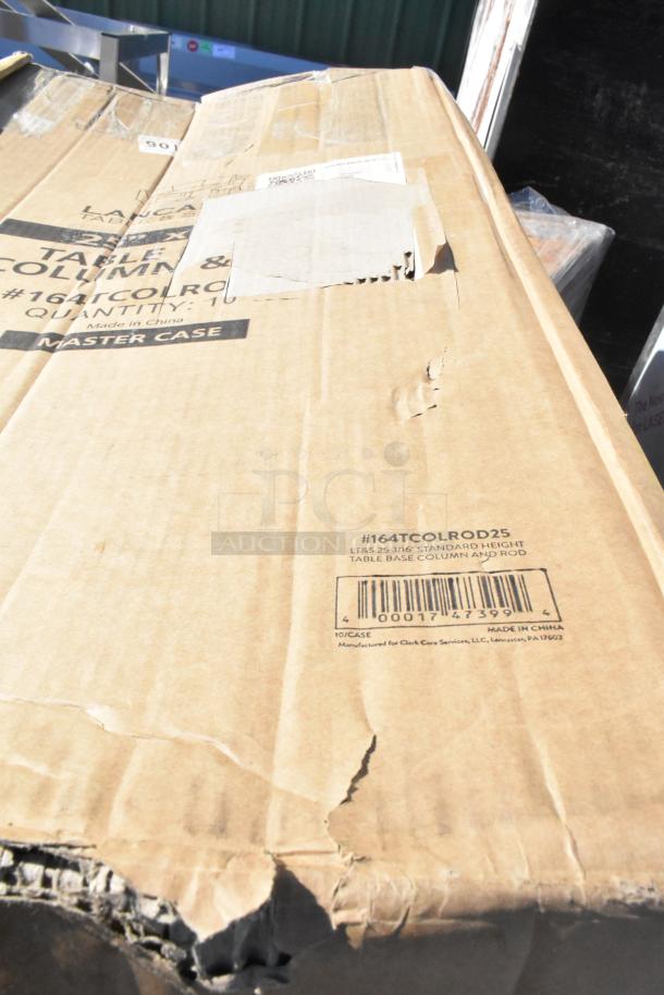 Cardboard box with some scratches and dents, labeled with table base column and rod details, barcode, and "Made in China."