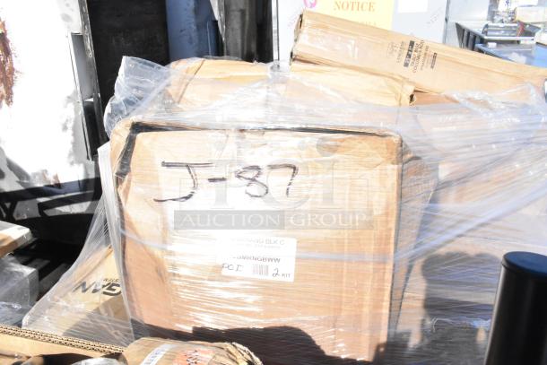 Nine brand new scratch and dent items, including ingredient bin and dish table, wrapped in plastic. Box marked with "J-87".