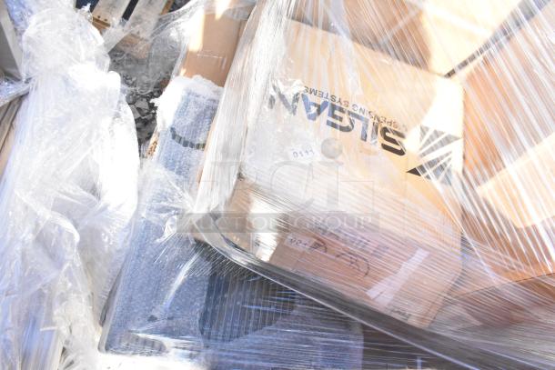 Packaged items in plastic wrap, including a box marked "Sistema," indicating brand new scratch and dent condition.