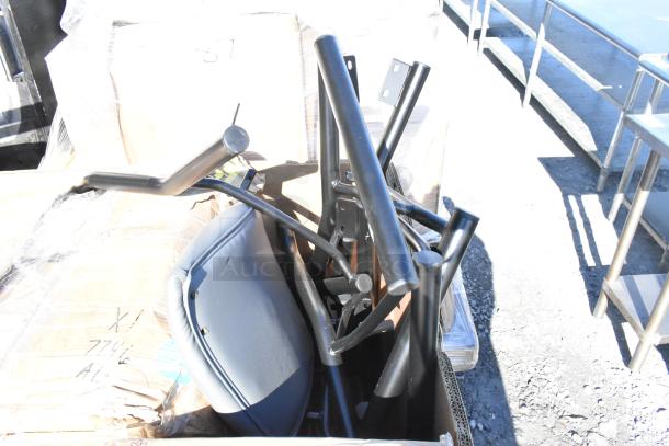 Box of six new scratch and dent items, including black metal cart components. Items are in original packaging.