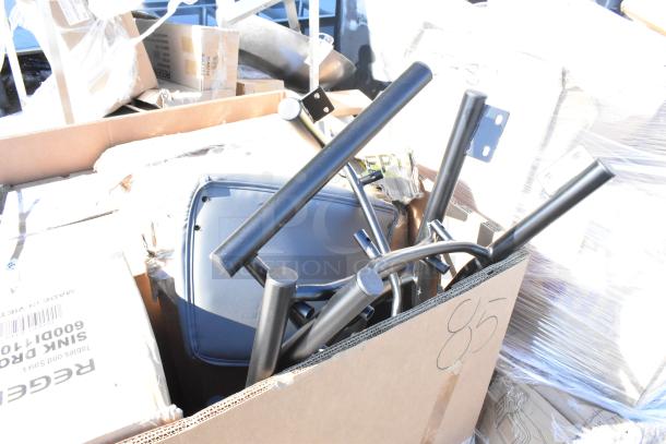 Assorted brand new scratch and dent items in boxes, including metal cart parts. Auction listing offers six times your bid value.