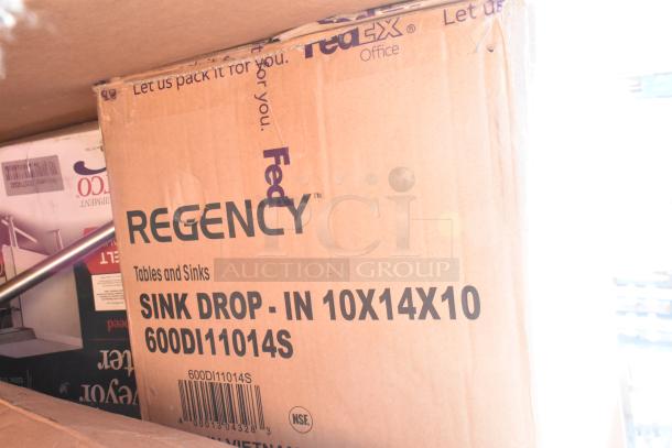 Cardboard box labeled "Regency Sink Drop-In 10x14x10" with FedEx markings, indicating new sink model 600DI11014S.