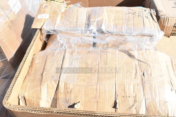 Packaging for 6 brand new scratch and dent items, including a cart and toaster oven. Boxes show slight wear, wrapped in plastic.