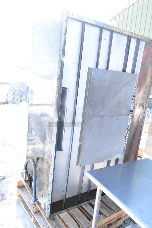 Montague commercial natural gas single deck pizza oven with a stainless steel exterior, mounted on a pallet. Small wear visible.