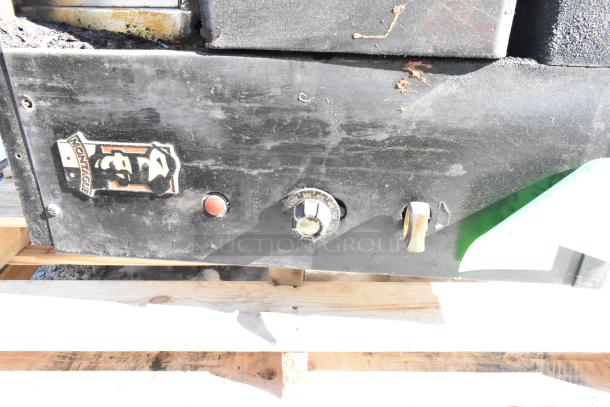 Montague Commercial Natural Gas Pizza Oven, single deck, black finish, visible wear, brand logo, temperature dial.