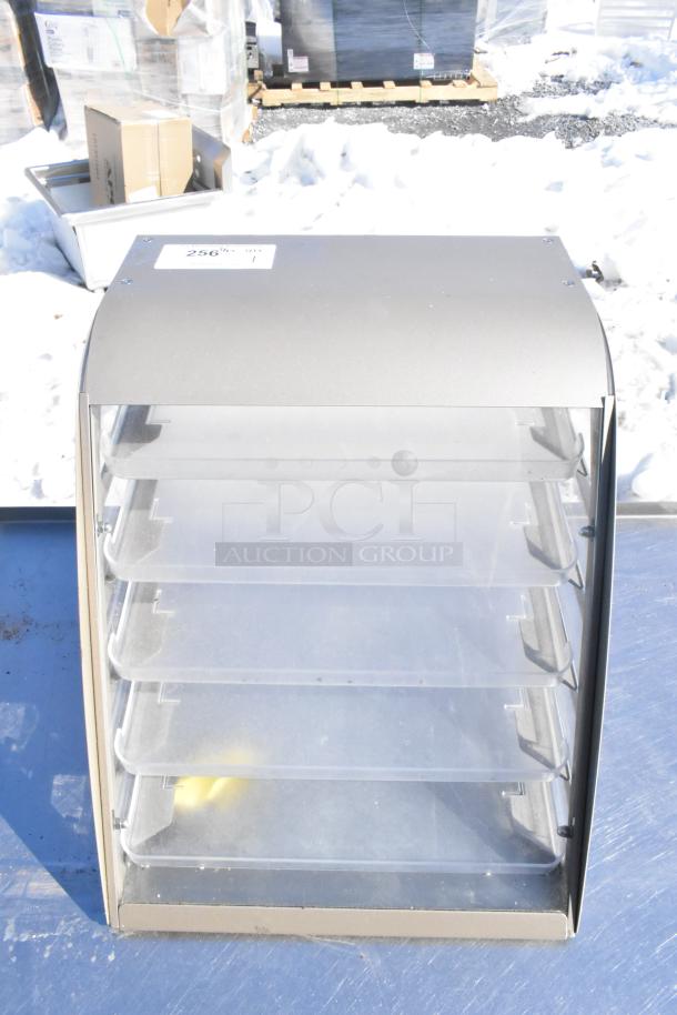 Nemco Countertop Dry Cookie Merchandising Case with multiple clear shelves, excellent condition, ideal for bakery display.