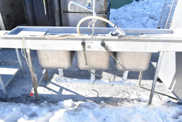 Commercial 3 bay sink with dual drain boards, faucet, handles, and spray nozzle attachment. Sturdy condition. Label: T9-3-54-18RL.