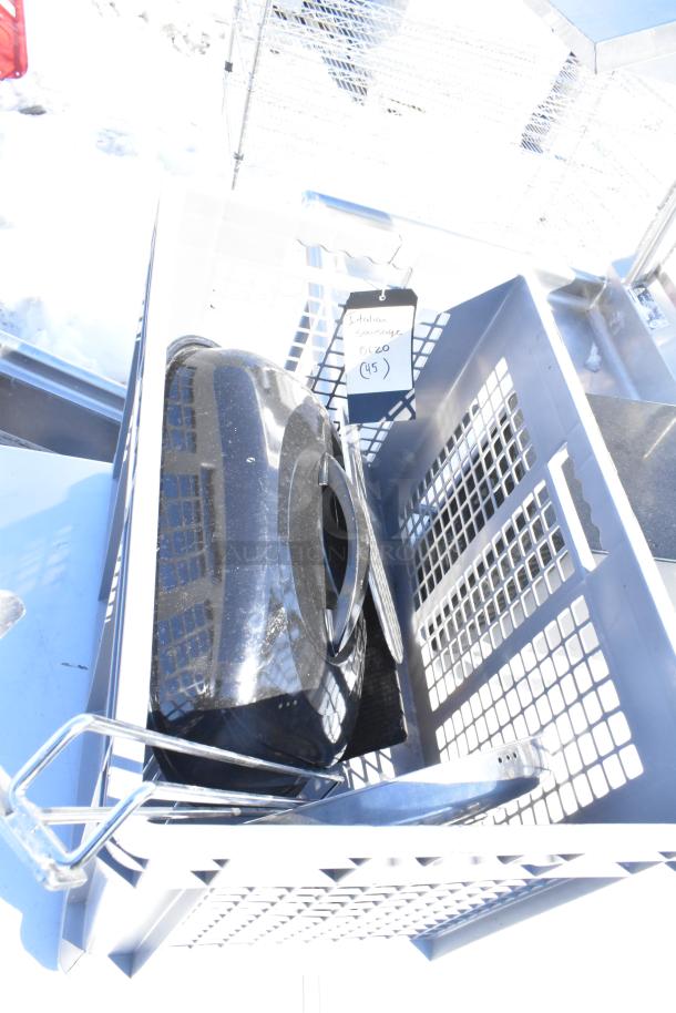 Lot of miscellaneous items in a gray bin; includes black plastic item and metal frame. Tag reads "Italian Sausage 020 (45)."