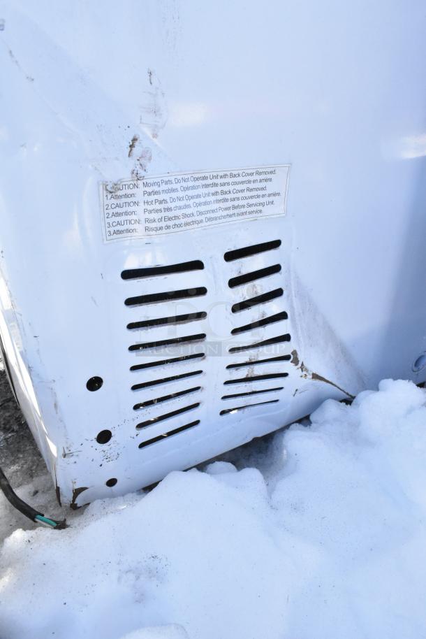 Coldline BD-600 chest freezer rear view with caution label. Some visible wear. 115 Volts, 1 Phase model.