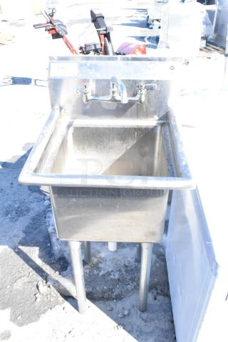 Commercial single bay sink with faucet and handles, stainless steel, sturdy condition, label indicates model 270.