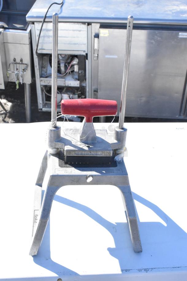 Insta Cut 35 metal countertop vegetable dicer with red handle, stainless steel blades, and sturdy frame; used condition.