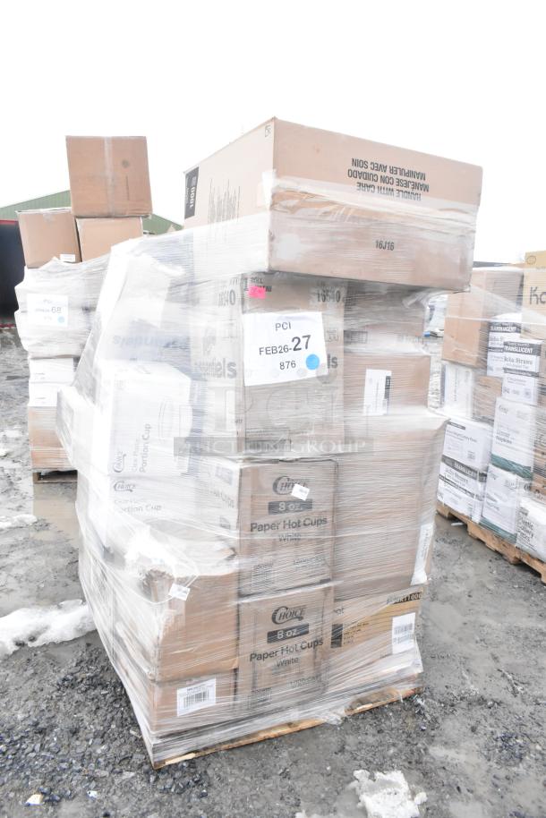 Pallet of 25 new scratch and dent items, including paper hot cups and toilet tissue. Boxes wrapped in plastic with visible labels.