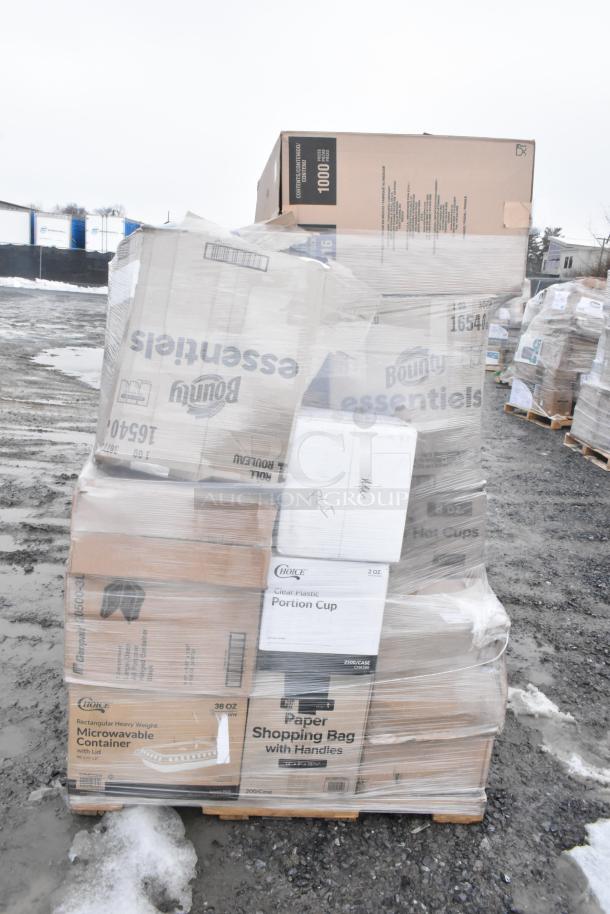 Pallet with new scratch and dent items including Bounty tissues, Choice portion cups, microwave containers, and shopping bags.