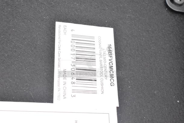 Barcode label for LT&S Mid-Century Cognac Vinyl Barstool Cushion, made in China, manufactured for Clark Core Services.
