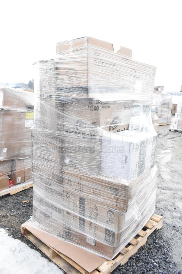 Shrink-wrapped pallet with new scratch and dent items including gloves, towel rolls, and bakery boxes, on outdoor lot.