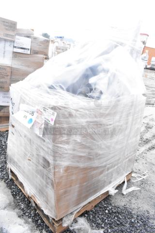 Pallet with 12 new scratch and dent items, wrapped in plastic. Includes dishtable and chair frames. Labels with handling info visible.