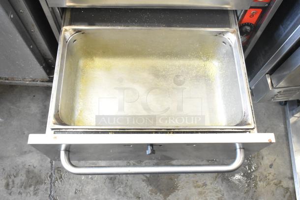 2017 Vulcan VW3S Commercial Warming Drawer, 3 drawers, 120V, 1 phase, stainless steel. Visible wear and residue inside.