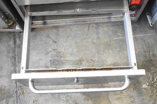 2017 Vulcan VW3S commercial 3 drawer warming drawer in stainless steel, open, showing inside, 120V, 1 phase.