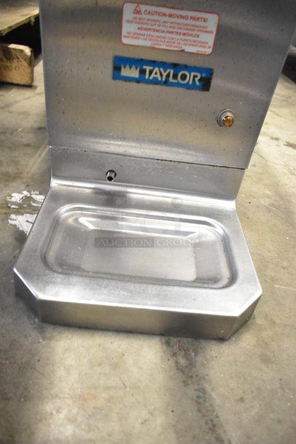 Taylor RD30-12 countertop frozen drink machine, stainless steel, single flavor, 115V, with caution label and Taylor branding.